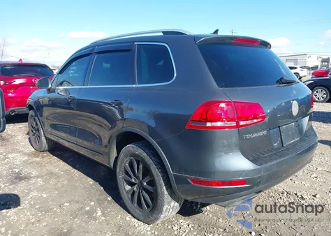 2014 Volkswagen Touareg 3.6L Sport z USA, uszkodzony, nr VIN WVGEF9BP2ED008972